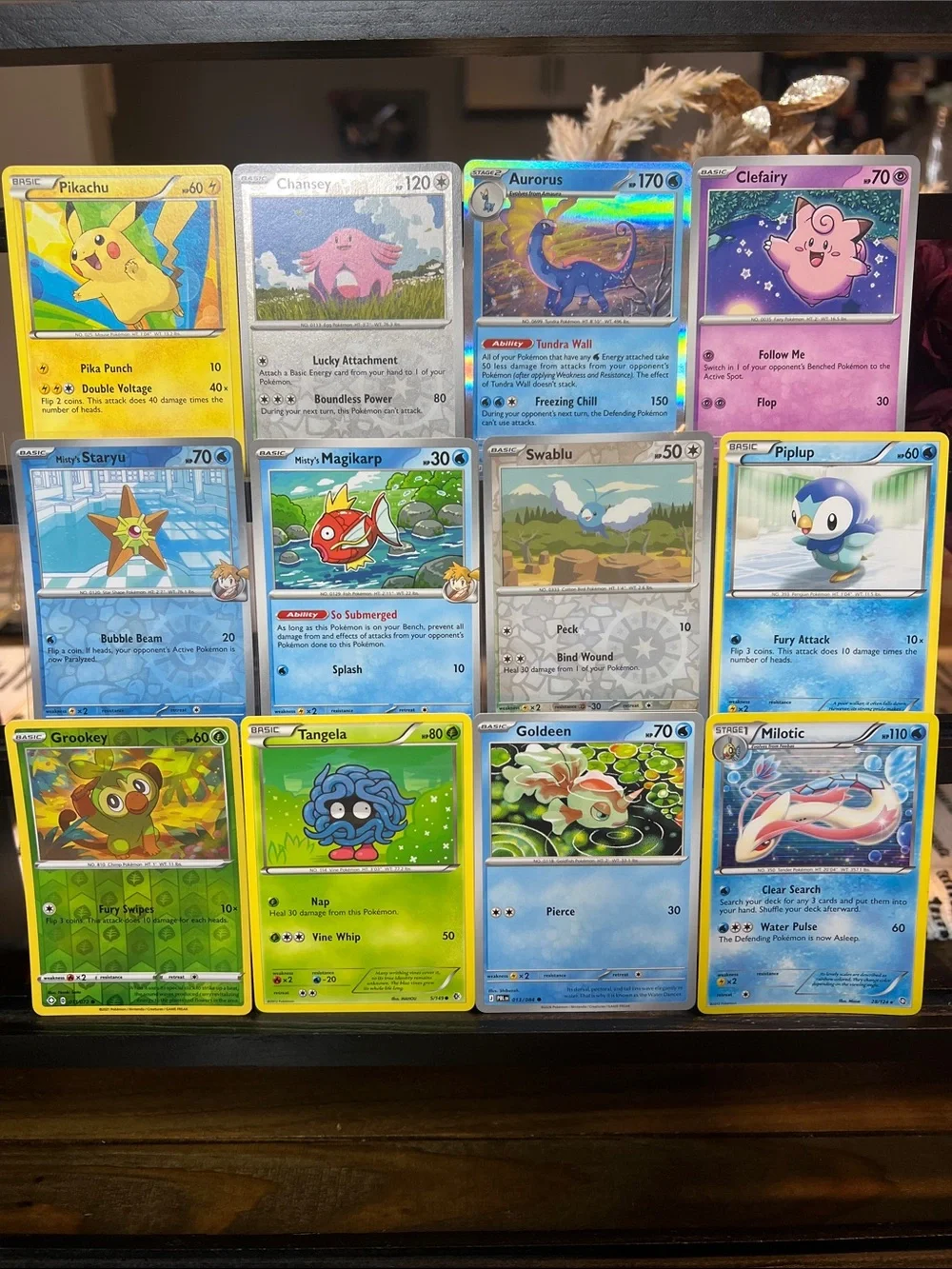 🦋Pokemon 12-card Lot. Includes holo/reverse holo/reg